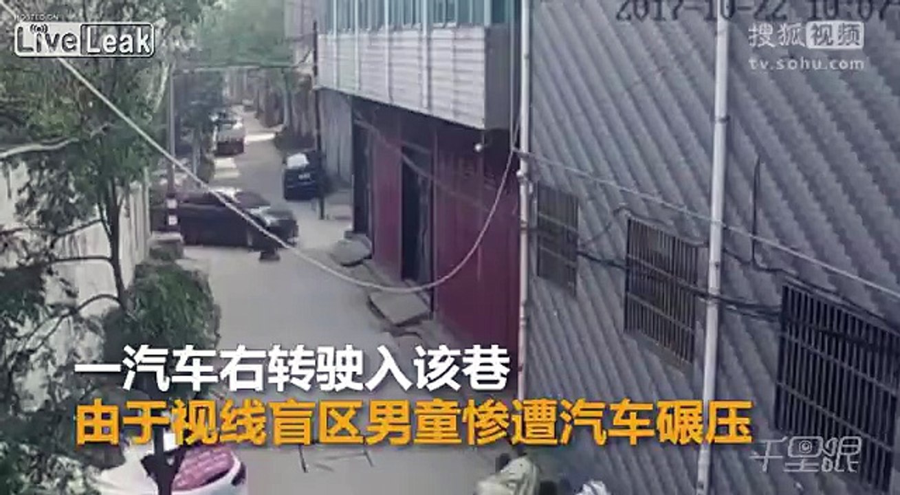 Little boy on a tricycle gets ran over by an car