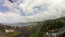 Lazy black guy pilots helicopter with knees while he does paper work...