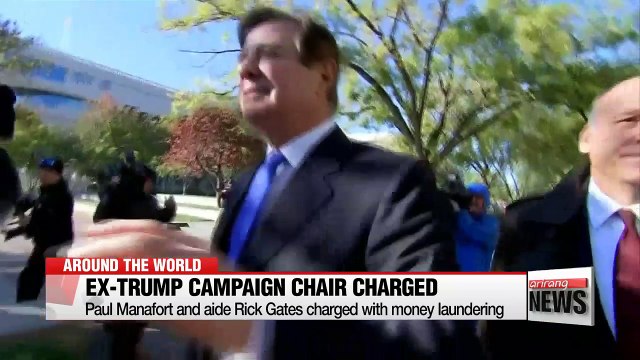 Two ex-Trump aides charged in Russia probe, third pleads guilty