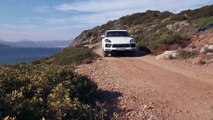 Porsche Cayenne Turbo Carrara White Metallic Driving off road