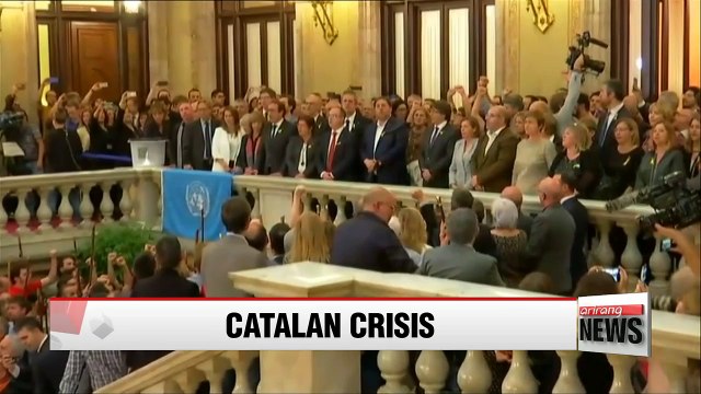 Deposed Catalan leader Carles Puigdemont flees to Brussels