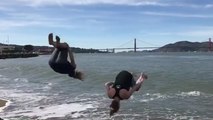 Girl Fails Trying To Backflip Into Water