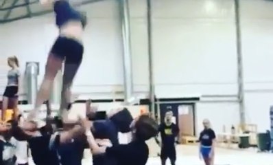Cheerleader Accidentally Kicks Guy In Face