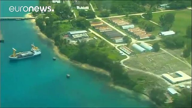 Tensions rise as refugees refuse to leave Australian camp in Papua New Guinea amid safety fears