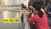 Girl tries to commit suicide by jumping from a bridge, strangers grab her arms