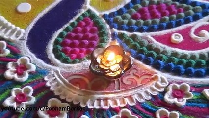 Easy, small and unique peacock rangoli | Easy rangoli designs with colors by Poonam Borkar