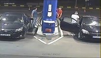 Gas Station Clerk Puts out a Man's Cigarette