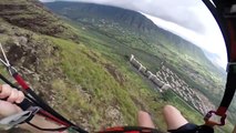 Paragliding through a tiny gap between two buildings!! (People are Awesome)