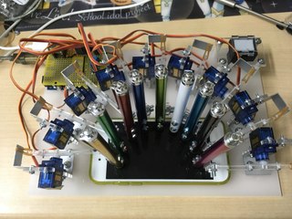 Automated Robot Gets High Score on Rhythmic iPhone Game