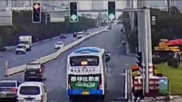 Wrong-way driver crashes into central reservation and flips