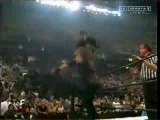 WWE - Undertaker Chokeslams Shane McMahon from top rope Thro