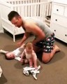Dad Has His Hands Full While Getting Daughters Ready For Bed