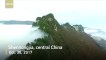 Sea of clouds flows like waterfall in central China