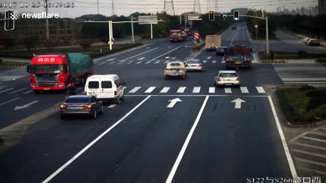 Scooter driver narrowly escapes being run over after running red light