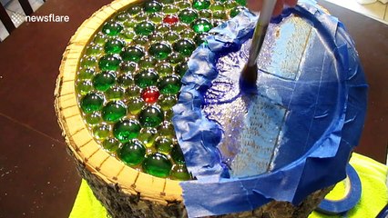 Man uses log to make a cool side table