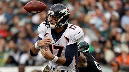 Chris Long muscles past Menelik Watson to strip-sack Brock