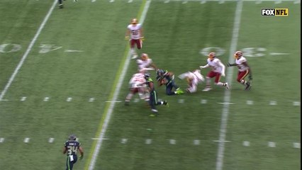 Ryan Kerrigan shoves Russell Wilson short of first down