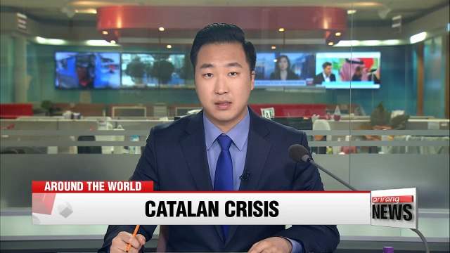 Ex-Catalan leader, officials surrender to Belgian police