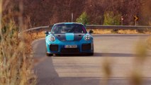 Porsche 911 GT2 RS in Miami Blue Driving on the road