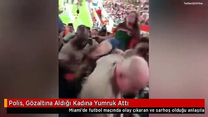 Polis, Gözaltına Aldığı Kadına Yumruk Attı
