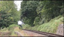 British Steam Engine pulling a 8 Coach Train