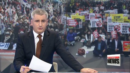 Hundreds take to the streets to mark Trump's visit to S. Korea