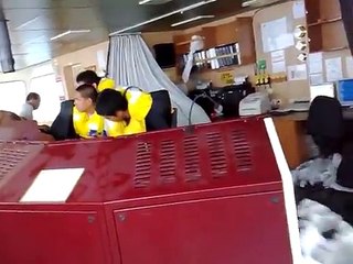 Ship in big waves at sea from Main cabin desk