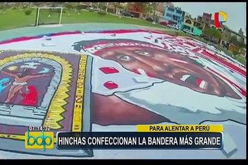 Download Video: Hinchas confeccionan la bandera más grande de la historia para alentar a la selección