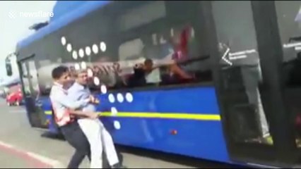 Airline staff assault passenger on airport tarmac