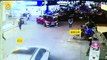 A SUV hits a pedestrian then crashes into a pharmacy