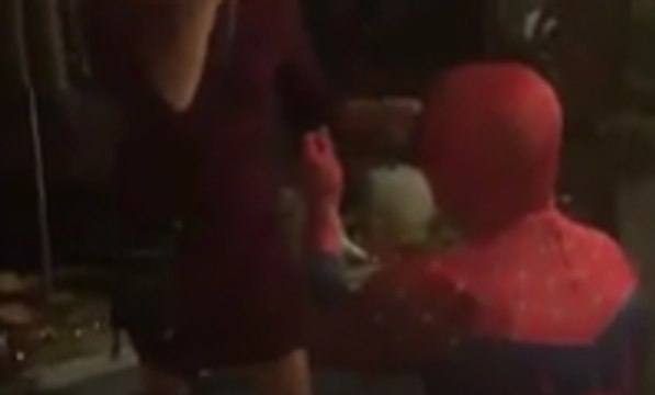Boyfriend Dressed As Spider-Man Surprises Girlfriend With Marriage Proposal During Girls' Night Out