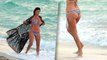 Kourtney Kardashian Shows Off Her Curves in a String Bikinii