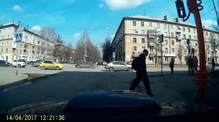 Crosswalk Light Falls Over After Pedestrian Touches It