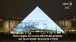 Des images du musée Abu Dhabi sur la pyramide du Louvre