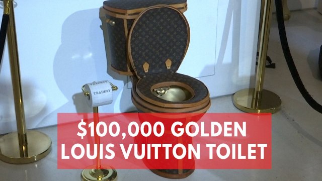 Golden toilet covered in luxury Louis Vuitton monogram bags on sale for $100,000