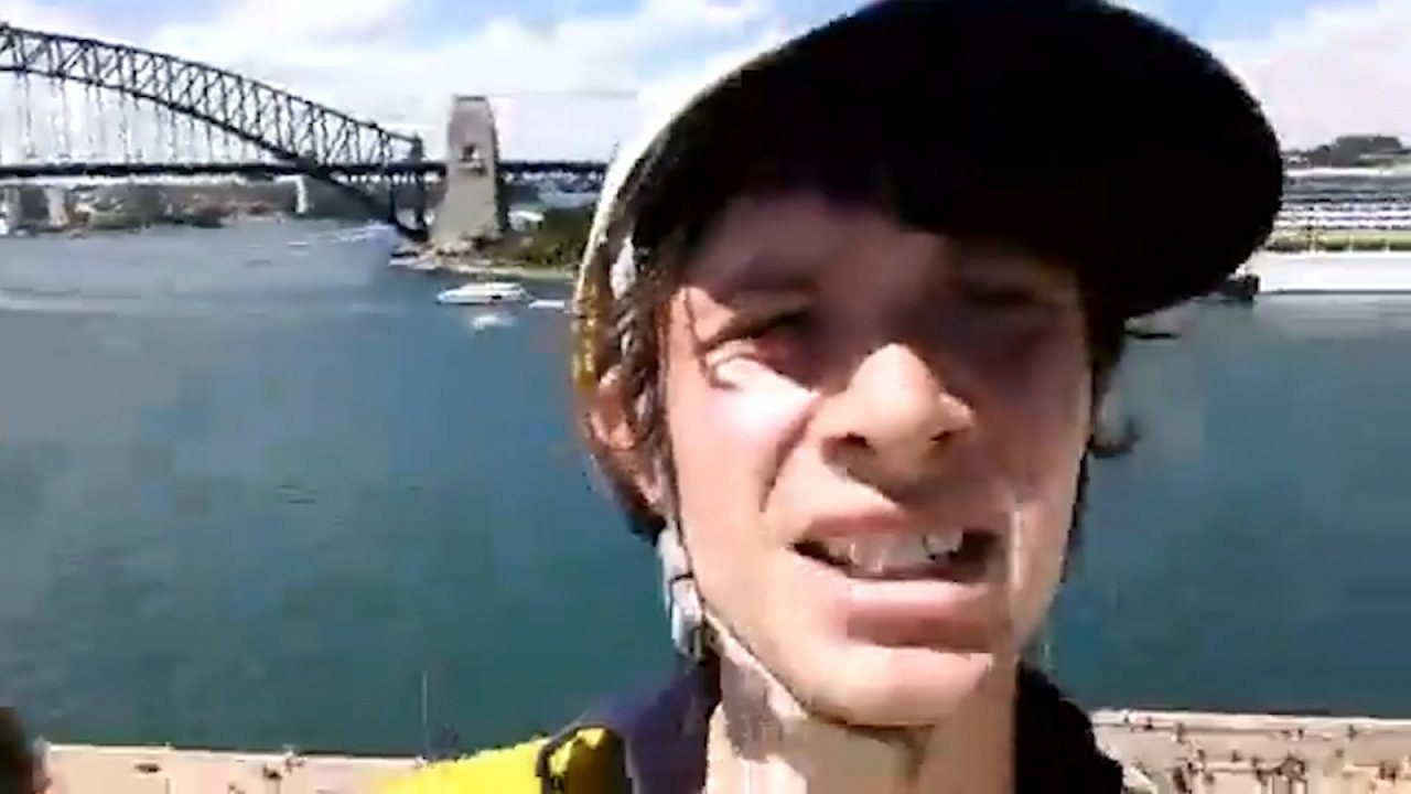 Activists scale Sydney Opera House in protest of Manus island detention centre