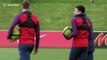Jesse Lingard and Phil Jones show off circus skills during England training
