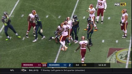 Rob Kelley tackled after bad snap