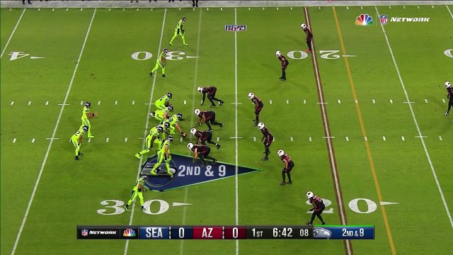Seattle Seahawks quarterback Russell Wilson lasers pass past Patrick Peterson, wide receiver Doug Baldwin takes off
