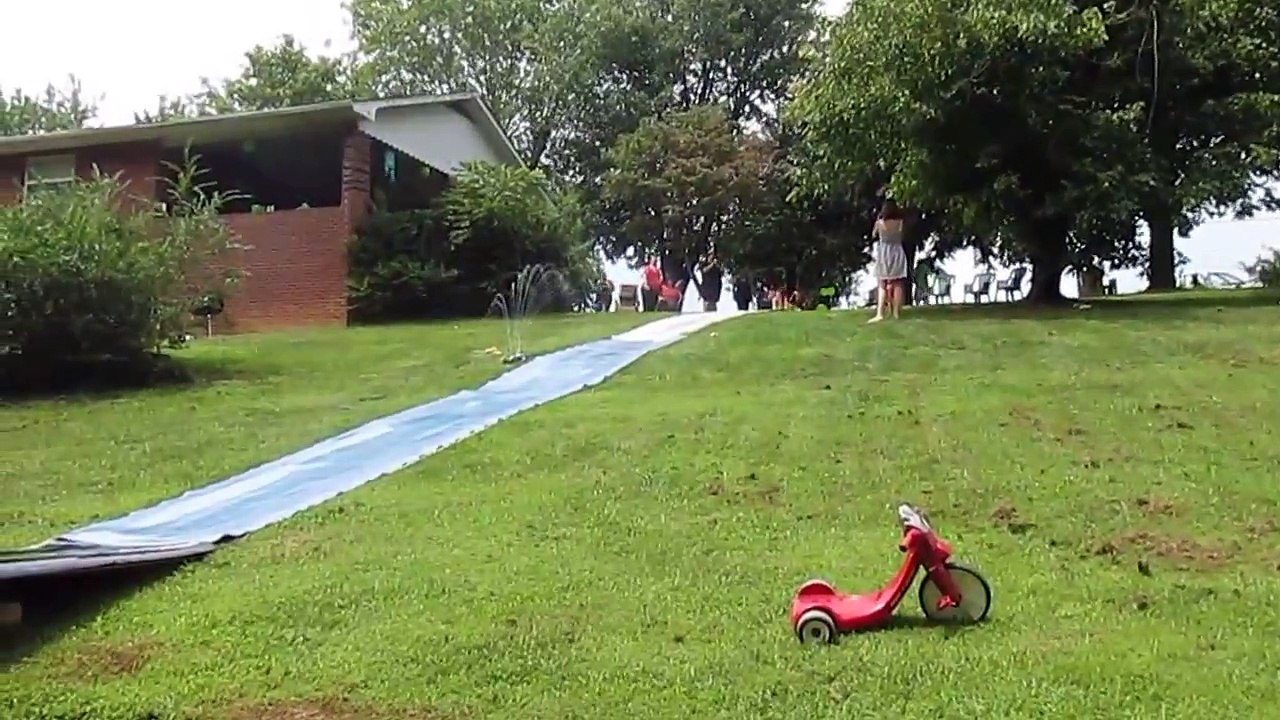 Girl Gains Too Much Speed On Slip-N-Slide