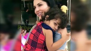 CUTE_ This baby refuses to leave Sunny Leone