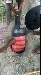 Dangerous accident man stuck in hole