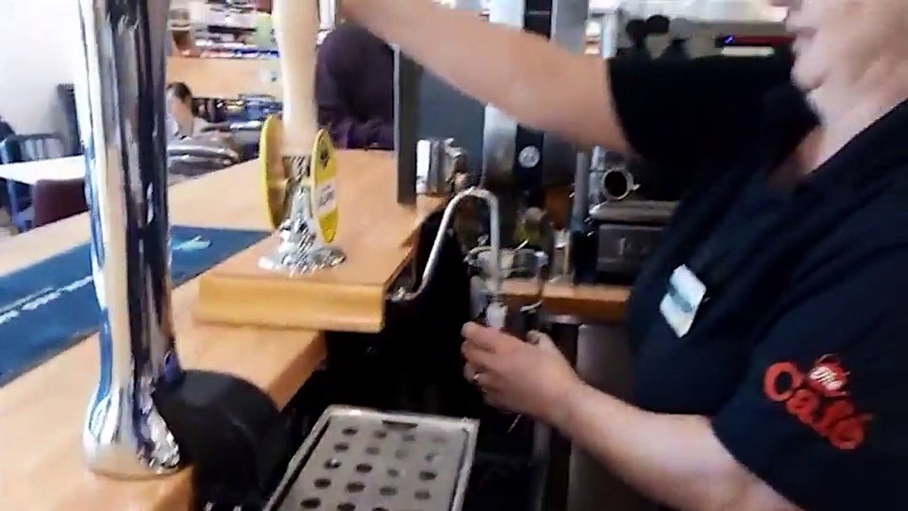 This supermarket has a pub inside