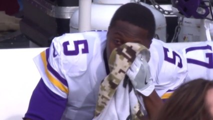 Teddy Bridgewater wipes away tears on the sideline