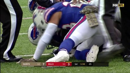 Ramon Humber squeezes the ball out of Josh Hill's hands for a fumble