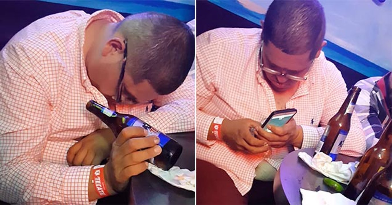 Drunk Guy At Party Can't Figure Out How His Cellphone Works