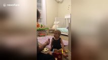 Baby is amazed by magic trick