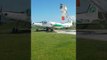 Agricultural Aircraft Takes Off From Grassy Makeshift Runway