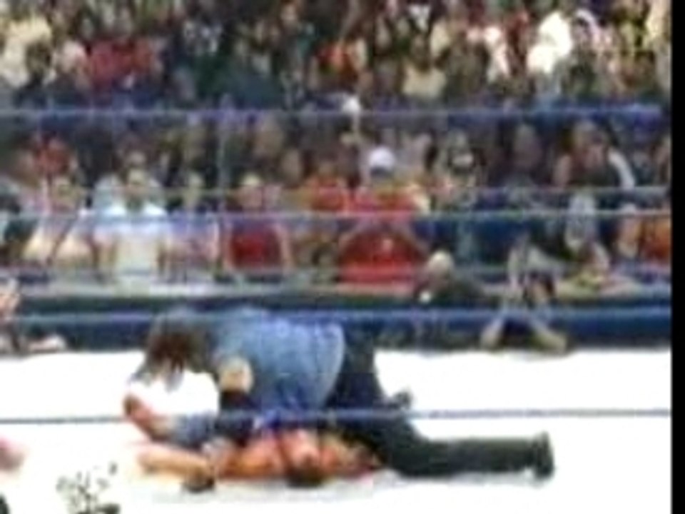 WWE- Undertaker Powerbombs Kurt Angle Big Time