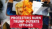 Protesters burn effigies of Donald Trump and Philippines president Rodrigo Duterte